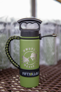 A close-up photo of the FIFTY/FIFTY brand water bottle included in every care package.