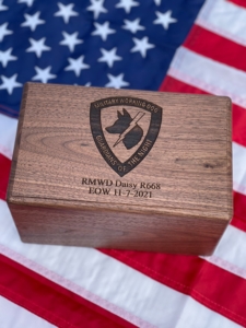 A Vietnam veteran dog handlers lovingly crafts these custom urns for the MWDTSA EOW program.