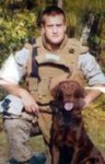 Lance Cpl. William H. Crouse IV and his detection dog Cane.